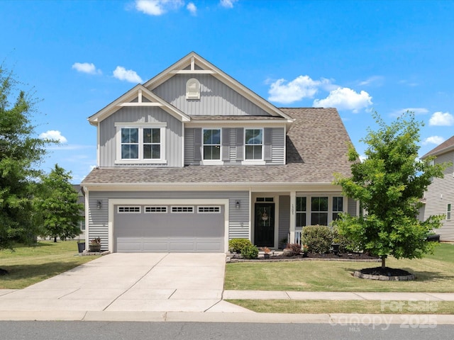1305 Kings Grove Dr, York, SC 29745 - craftsman inspired home with board and batten siding, a front yard, driveway, and an attached garage
