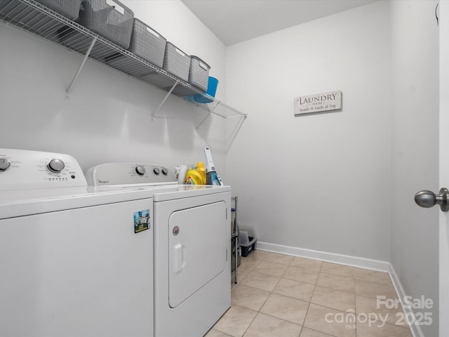 1305 Kings Grove Dr, York, SC 29745 - laundry room featuring separate washer and dryer, light tile patterned floors, and baseboards