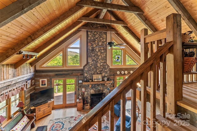 6338 W View Dr, Newland, NC 28657 - unfurnished living room with wood ceiling, light wood-style flooring, a fireplace, beamed ceiling, and high vaulted ceiling