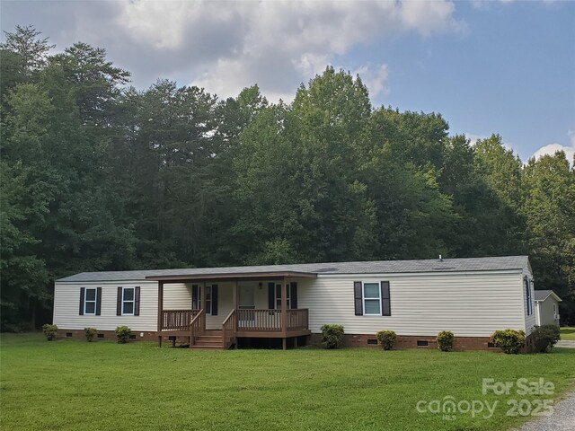 624 Brevard St, Kings Mountain, NC 28086 - manufactured / mobile home featuring crawl space, a porch, and a front yard