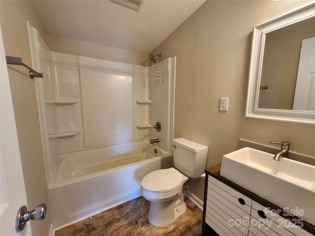 bathroom with toilet, vanity, lofted ceiling, and bathing tub / shower combination