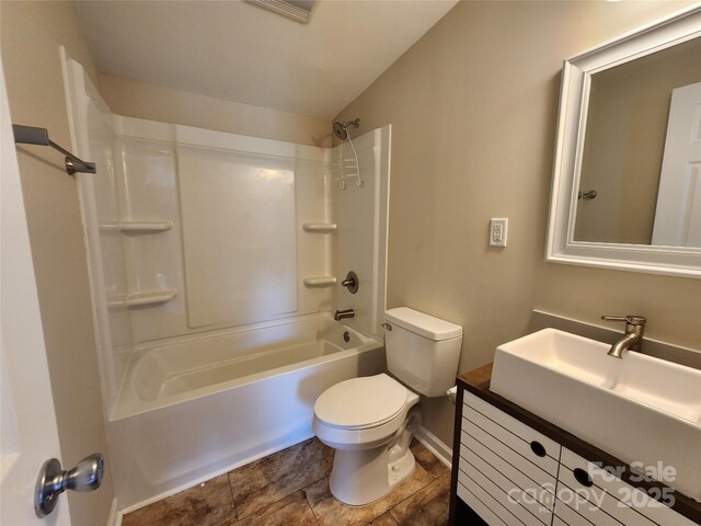 624 Brevard St, Kings Mountain, NC 28086 - bathroom with toilet, vanity, lofted ceiling, and bathing tub / shower combination