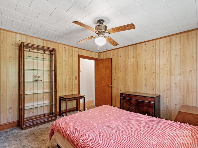 43 Charter Way, Burnsville, NC 28714 - bedroom with carpet flooring, wood walls, and a ceiling fan