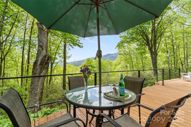 319 Twilight Way, Burnsville, NC 28714 - wooden terrace featuring outdoor dining area and a mountain view