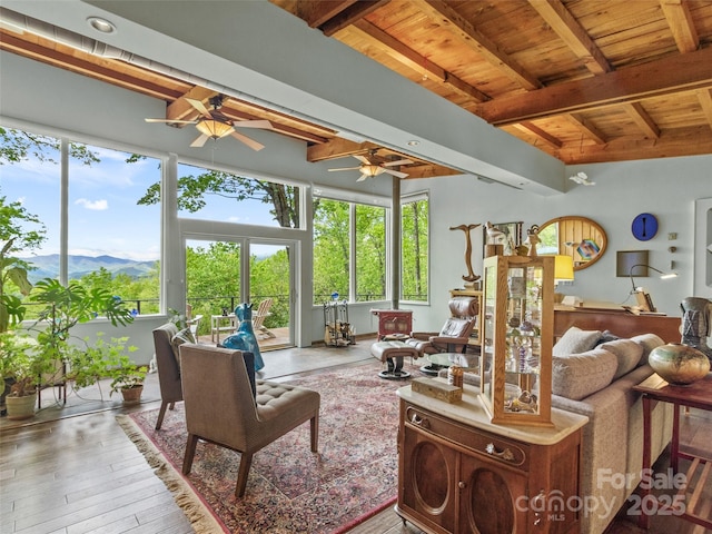 319 Twilight Way, Burnsville, NC 28714 - living area with ceiling fan, wooden ceiling, healthy amount of natural light, beamed ceiling, and a mountain view