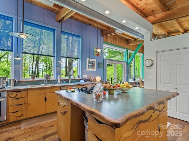 319 Twilight Way, Burnsville, NC 28714 - kitchen featuring wood ceiling, beam ceiling, a sink, light wood finished floors, and a kitchen island