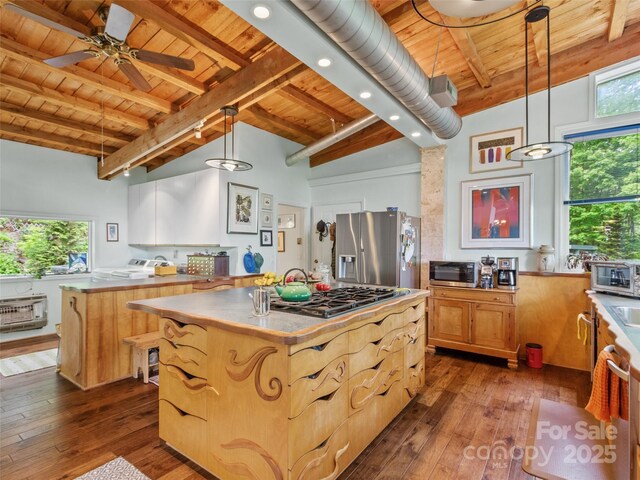 319 Twilight Way, Burnsville, NC 28714 - kitchen with stainless steel appliances, wood ceiling, beam ceiling, a kitchen island, and dark wood-style flooring
