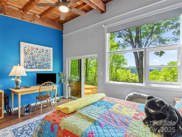 319 Twilight Way, Burnsville, NC 28714 - bedroom featuring wood ceiling, beamed ceiling, wood finished floors, access to outside, and baseboards