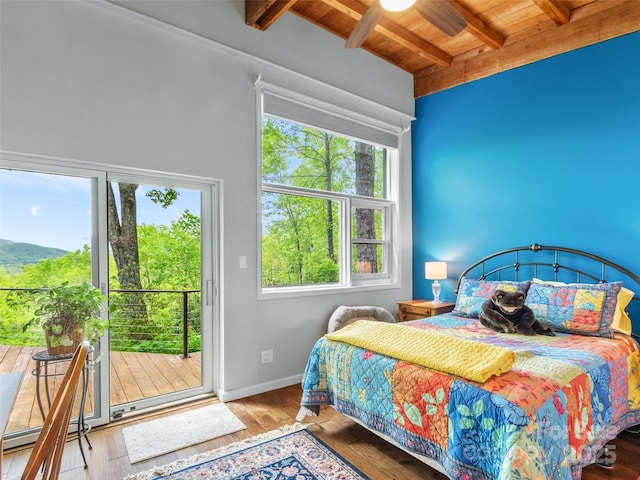 319 Twilight Way, Burnsville, NC 28714 - bedroom featuring wood ceiling, beam ceiling, access to outside, multiple windows, and hardwood / wood-style floors