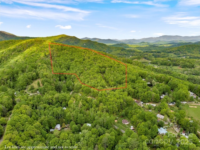 319 Twilight Way, Burnsville, NC 28714 - view of property location featuring a heavily wooded area, property boundaries highlighted, and a mountainous background