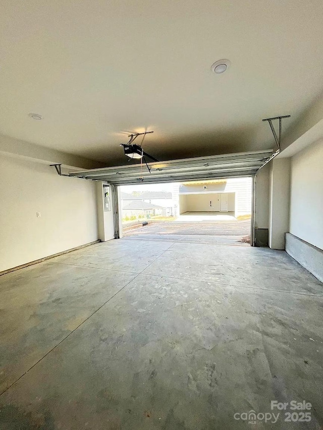 garage featuring a garage door opener