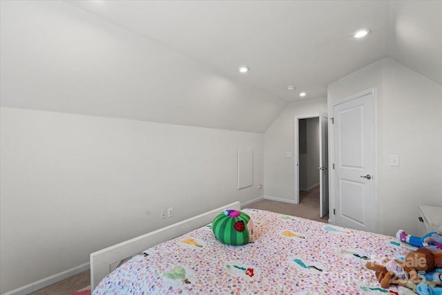 bedroom with carpet flooring, baseboards, vaulted ceiling, and recessed lighting