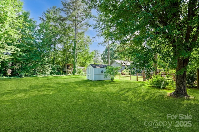 104 Gallarie Pl, Salisbury, NC 28144 - view of grassy yard with view of wooded area