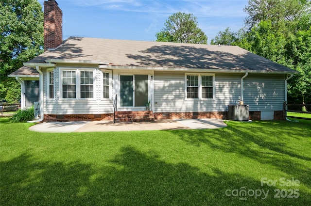104 Gallarie Pl, Salisbury, NC 28144 - view of front of house featuring entry steps, crawl space, a patio, a chimney, and a front yard