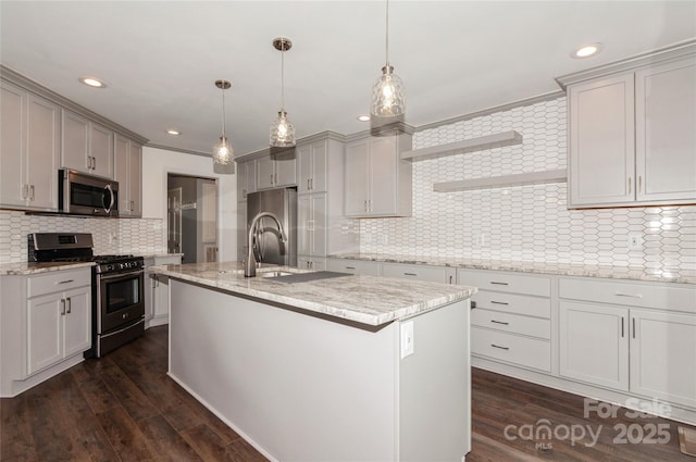 104 Gallarie Pl, Salisbury, NC 28144 - kitchen featuring stainless steel appliances, tasteful backsplash, open shelves, a center island with sink, and light stone counters