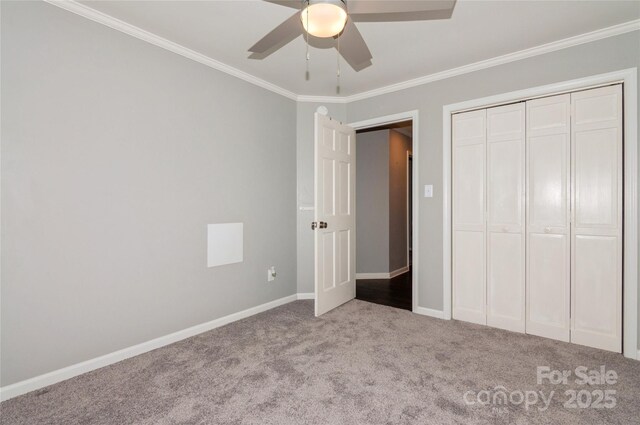 104 Gallarie Pl, Salisbury, NC 28144 - unfurnished bedroom with crown molding, carpet floors, baseboards, a closet, and a ceiling fan