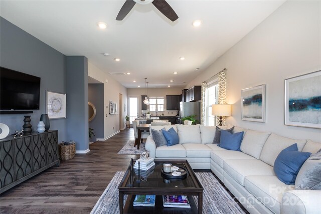 9521 Ainslie Downs St, Charlotte, NC 28273 - living area featuring a ceiling fan, dark wood-style floors, baseboards, and recessed lighting
