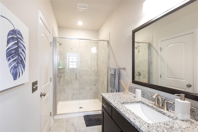 9521 Ainslie Downs St, Charlotte, NC 28273 - bathroom featuring a stall shower, vanity, and tile patterned flooring