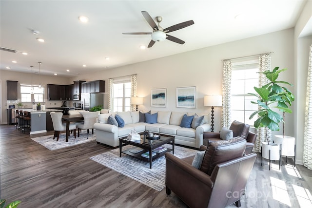 9521 Ainslie Downs St, Charlotte, NC 28273 - living room with dark wood-type flooring, a ceiling fan, and recessed lighting