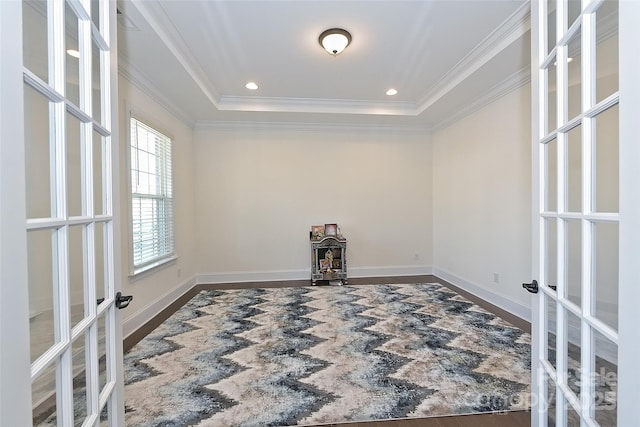 809 Brown Creek Dr, Matthews, NC 28104 - spare room featuring french doors, wood finished floors, crown molding, baseboards, and a raised ceiling
