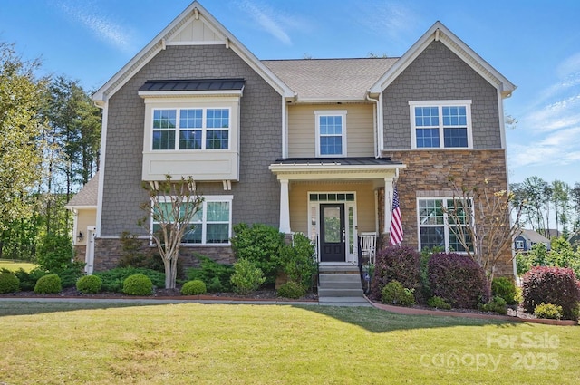 16831 Alydar Commons Ln, Charlotte, NC 28278 - craftsman inspired home with stone siding, a standing seam roof, a front lawn, and a metal roof