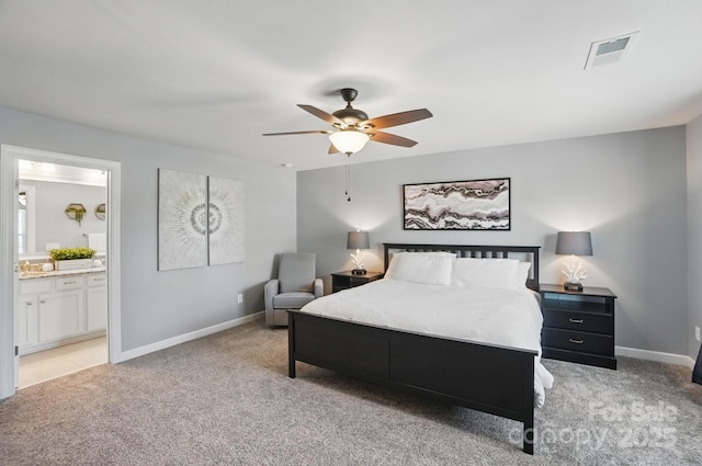 16831 Alydar Commons Ln, Charlotte, NC 28278 - bedroom featuring light carpet, connected bathroom, and ceiling fan