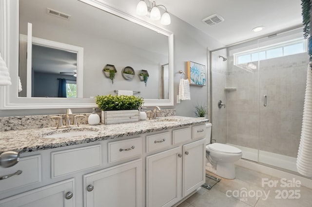 16831 Alydar Commons Ln, Charlotte, NC 28278 - full bath with double vanity, a stall shower, and tile patterned flooring