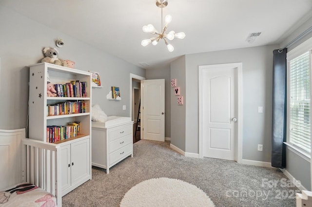 16831 Alydar Commons Ln, Charlotte, NC 28278 - bedroom featuring a chandelier and light colored carpet