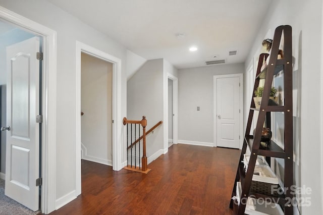 16831 Alydar Commons Ln, Charlotte, NC 28278 - hall with an upstairs landing and dark wood finished floors