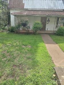154 N Meridian St, Rutherfordton, NC 28139 - entrance to property featuring a lawn