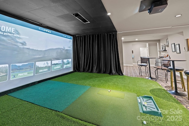 recreation room with golf simulator, carpet floors, baseboards, and recessed lighting