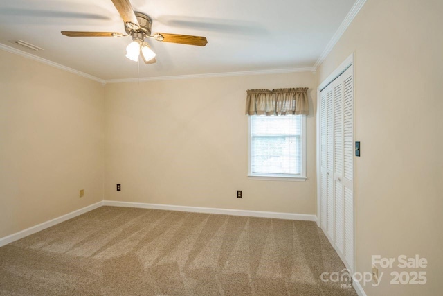 16612 Grapperhall Dr, Huntersville, NC 28078 - unfurnished room featuring crown molding, carpet, ceiling fan, and baseboards