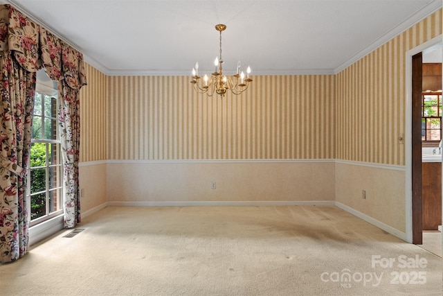 1940 12th St NE, Hickory, NC 28601 - spare room with a chandelier, wallpapered walls, carpet flooring, ornamental molding, and baseboards
