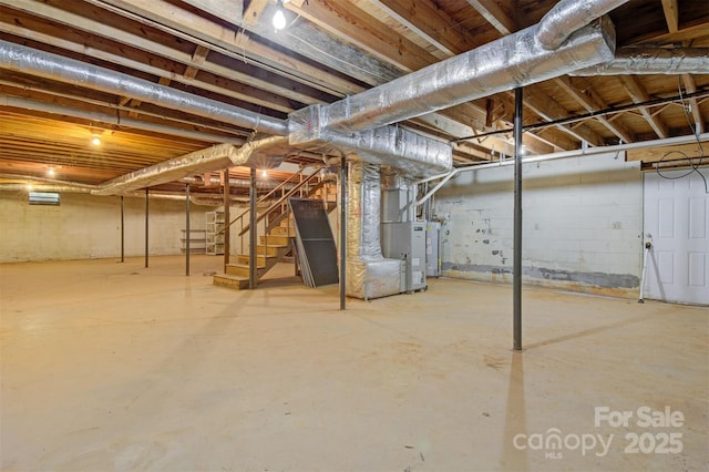 1940 12th St NE, Hickory, NC 28601 - unfinished below grade area featuring heating unit and stairs