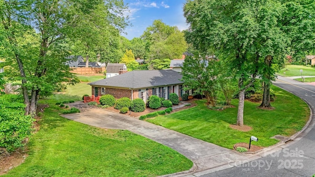 1940 12th St NE, Hickory, NC 28601 - ranch-style home with a front lawn, brick siding, and roof with shingles