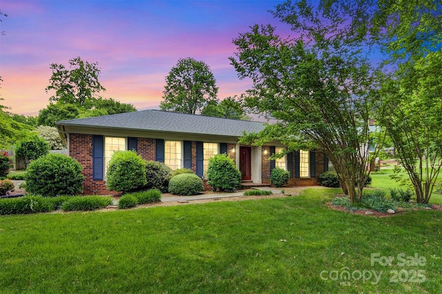1940 12th St NE, Hickory, NC 28601 - ranch-style house with brick siding and a lawn
