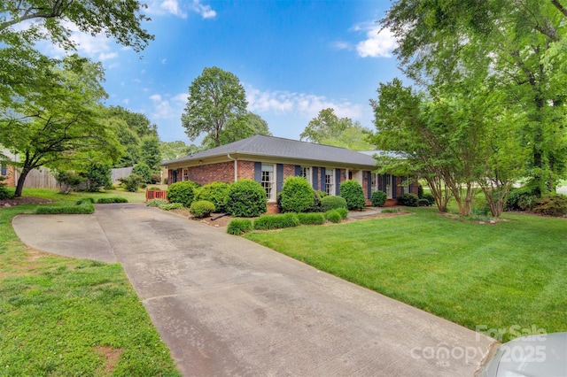 1940 12th St NE, Hickory, NC 28601 - ranch-style house featuring brick siding, a front lawn, and driveway