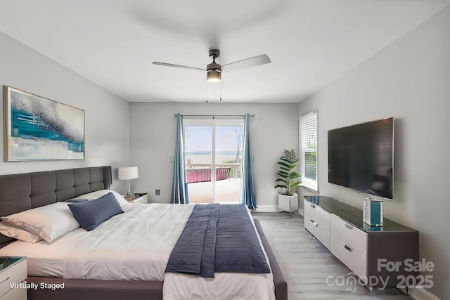 4516 Kiser Island Rd Unit 1, Terrell, NC 28682 - bedroom featuring access to outside, wood finished floors, baseboards, and a ceiling fan