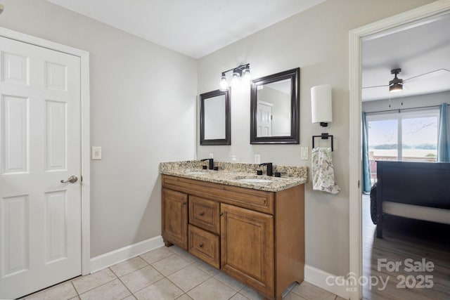 4516 Kiser Island Rd Unit 1, Terrell, NC 28682 - bathroom featuring baseboards, tile patterned flooring, a ceiling fan, and double vanity