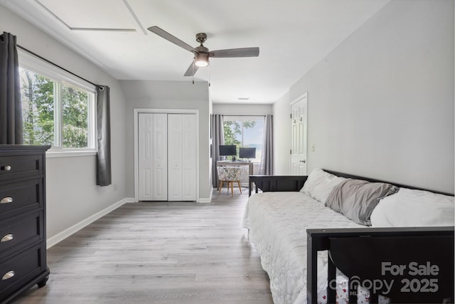 4516 Kiser Island Rd Unit 1, Terrell, NC 28682 - bedroom with multiple windows, light wood finished floors, baseboards, and a ceiling fan