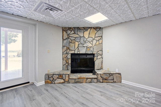 4516 Kiser Island Rd Unit 1, Terrell, NC 28682 - living room with wood finished floors, a fireplace, baseboards, and an ornate ceiling