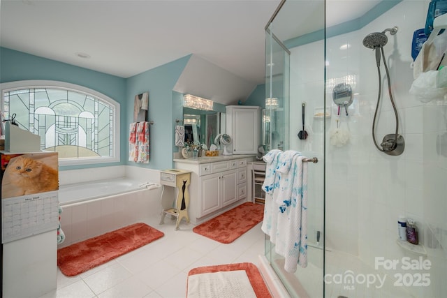 21216 Norman Shores Dr, Cornelius, NC 28031 - full bath featuring a stall shower, a bath, vanity, tile patterned floors, and lofted ceiling