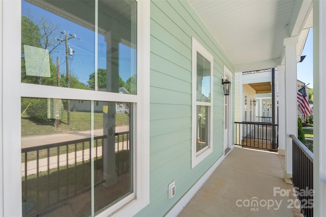 balcony featuring a porch