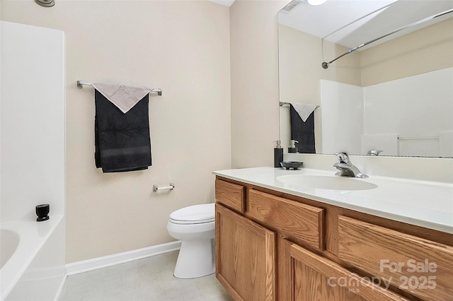 full bathroom featuring toilet, baseboards, vanity, a bath, and a shower