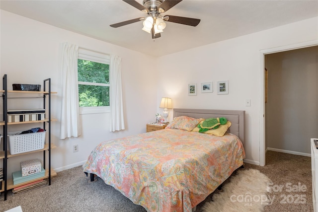 bedroom featuring carpet floors, baseboards, and ceiling fan