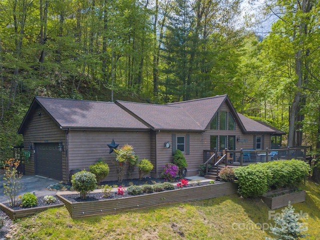 14 Bellewood Dr, Maggie Valley, NC 28751 - rustic home featuring a deck, a garage, asphalt driveway, and a shingled roof