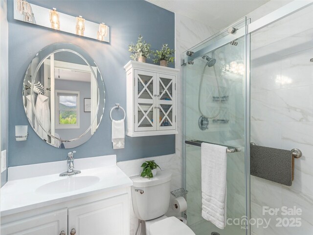 14 Bellewood Dr, Maggie Valley, NC 28751 - full bathroom with a stall shower, toilet, and vanity