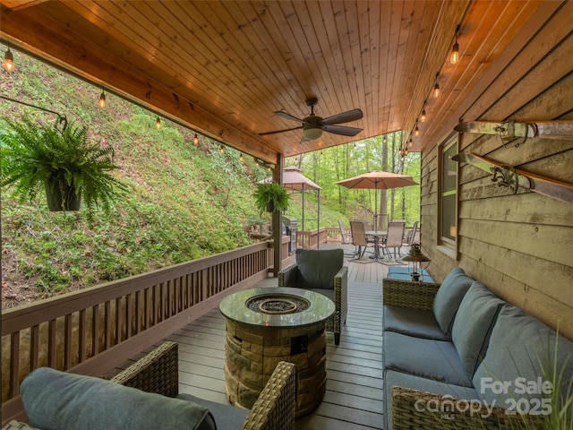 14 Bellewood Dr, Maggie Valley, NC 28751 - deck featuring an outdoor living space with a fire pit, outdoor dining space, and ceiling fan