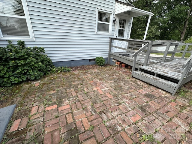 view of patio / terrace featuring a wooden deck