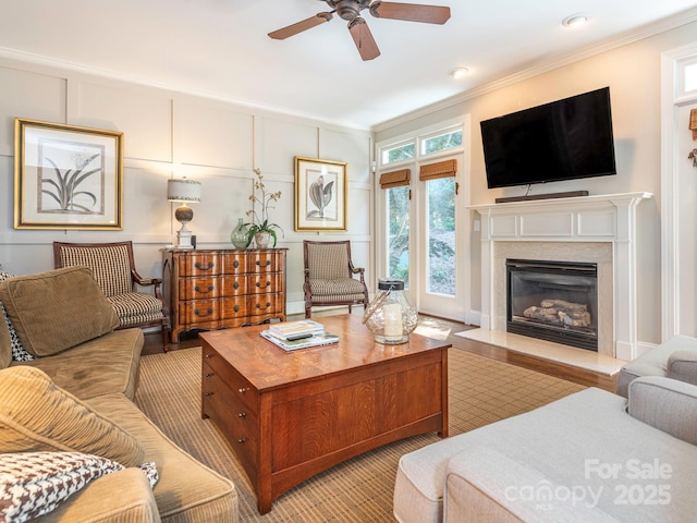 7040 Edenderry Dr, Charlotte, NC 28270 - living area with crown molding, a ceiling fan, and a high end fireplace